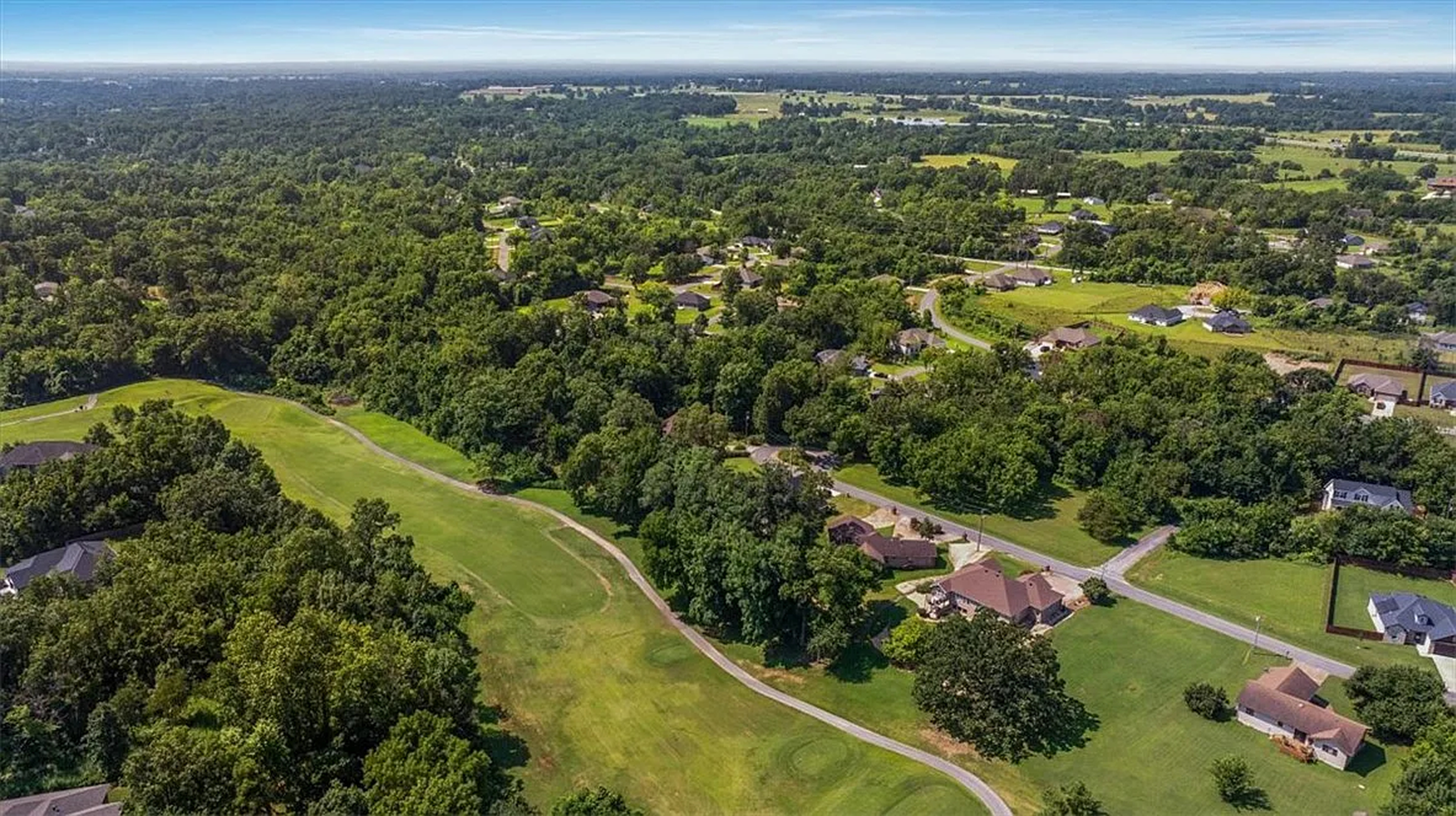 Aerial of Bella Vista fairways and the homesite