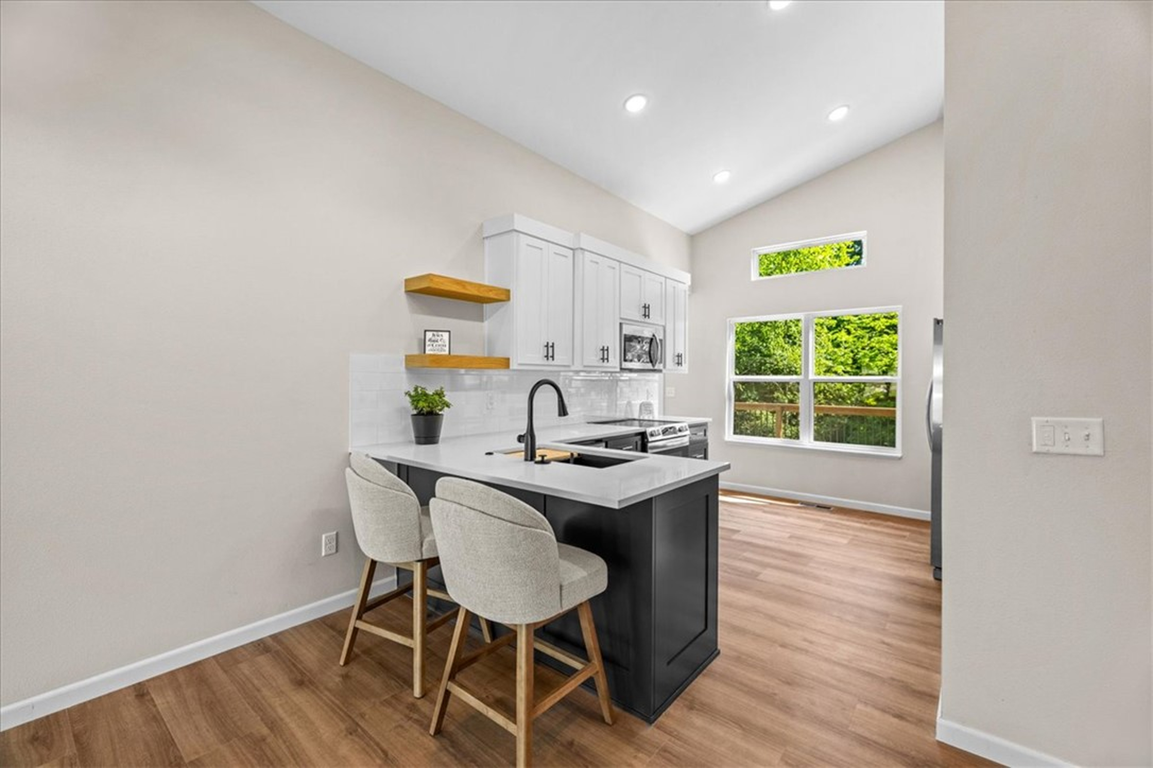 Front bedroom with transom and street view